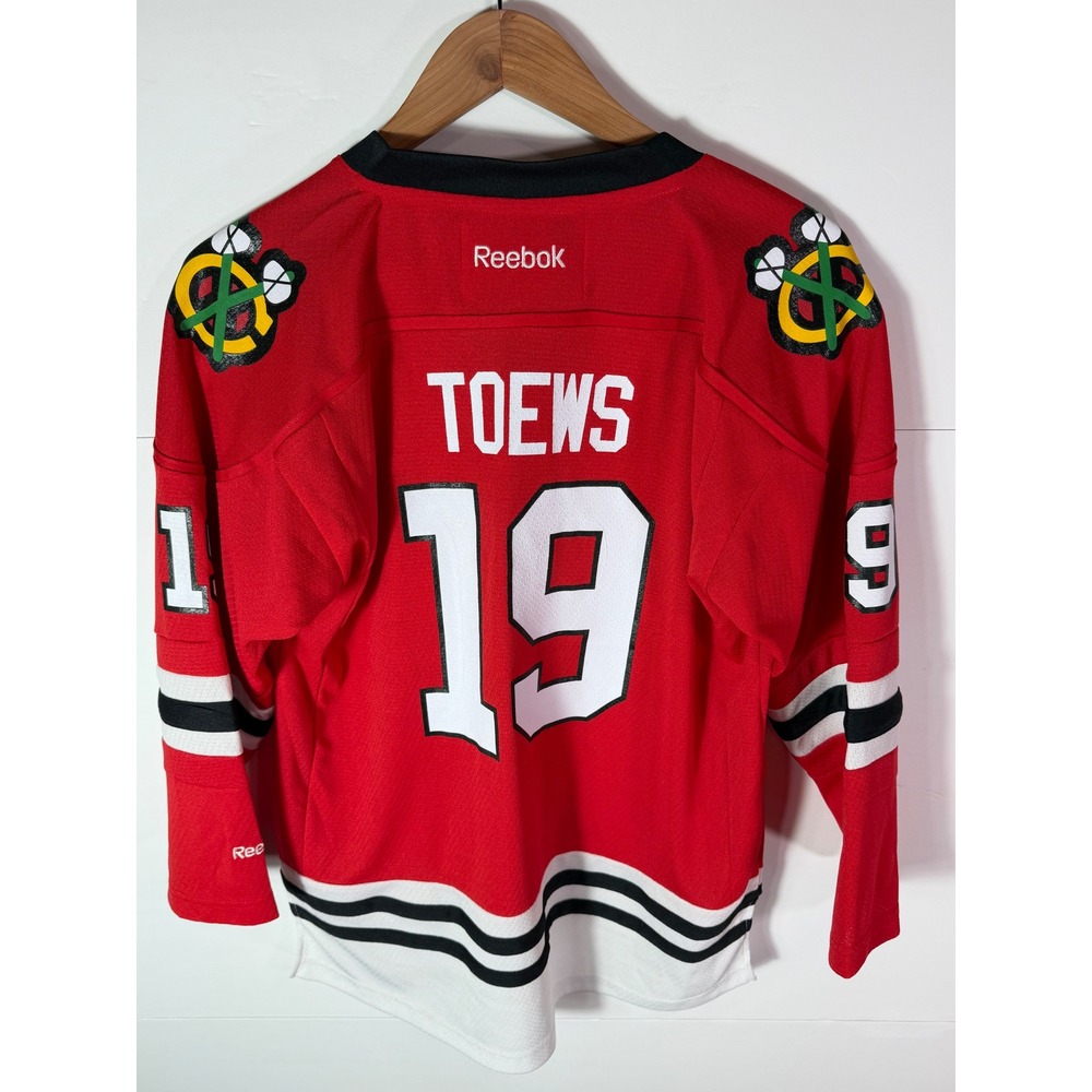 Reebok Chicago Blackhawks Jonathan Toews 19 Youth L/XL Red Hockey Jersey NHL
